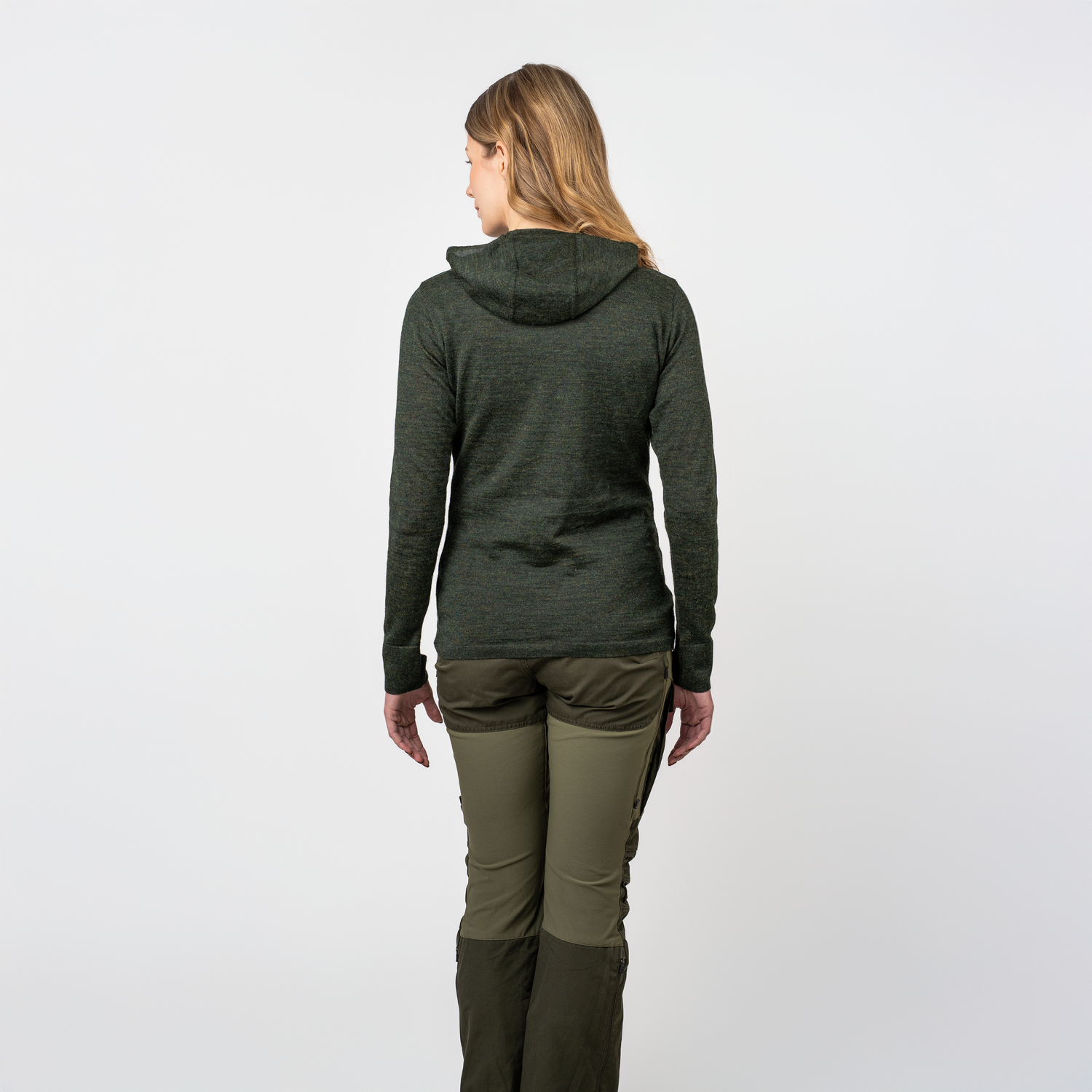 Vaeltaja100 alpacawool hoodie worn by woman photographed from behind

