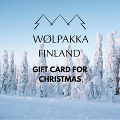 Wølpakka logo with gift card text under it. Winter landscape background.